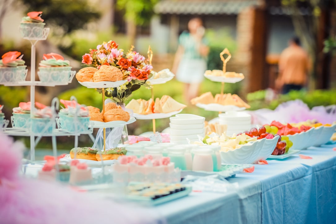 Various Desserts on a Table covered with Baby Blue Cover